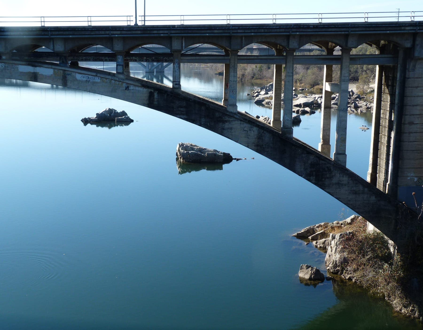 The Rainbow Bridge arching over the American River in Folsom, California